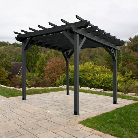 Quality built, 100% USA made pergola sitting on patio with outdoor landscaping. Sequoia Professional outdoor furniture proudly sold by Ember & Oasis! Featuring a 12-year residential limited warranty.